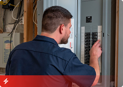 Electrical-Service-CTA Electrical service call-to-action tile: a technician working at an open residential electrical panel