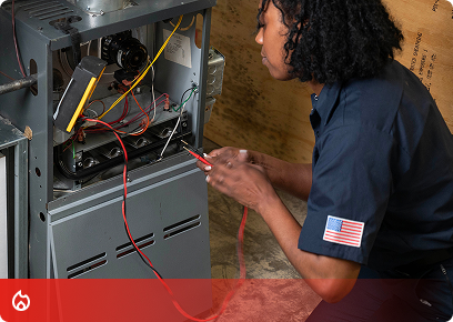 Heating-Service-CTA Heating service call-to-action tile: a technician testing the wiring inside an open furnace with multimeter leads